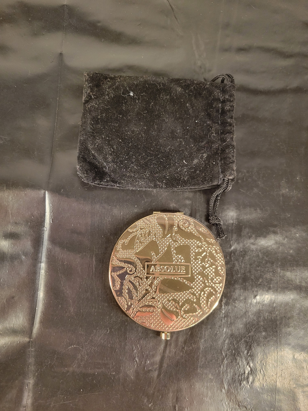 Lancôme Absolue limited edition compact mirror, black velvet pouch